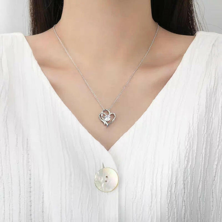 COLLANA "DOPPIO CUORE" CON ORECCHINI OMAGGIO.